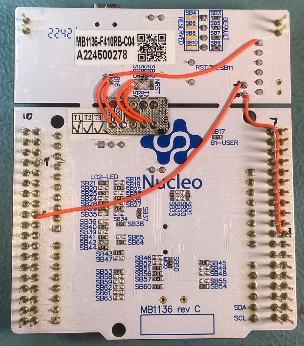Back-side of Nucleo with wire-jumpers to complete the external MCU programming modification.